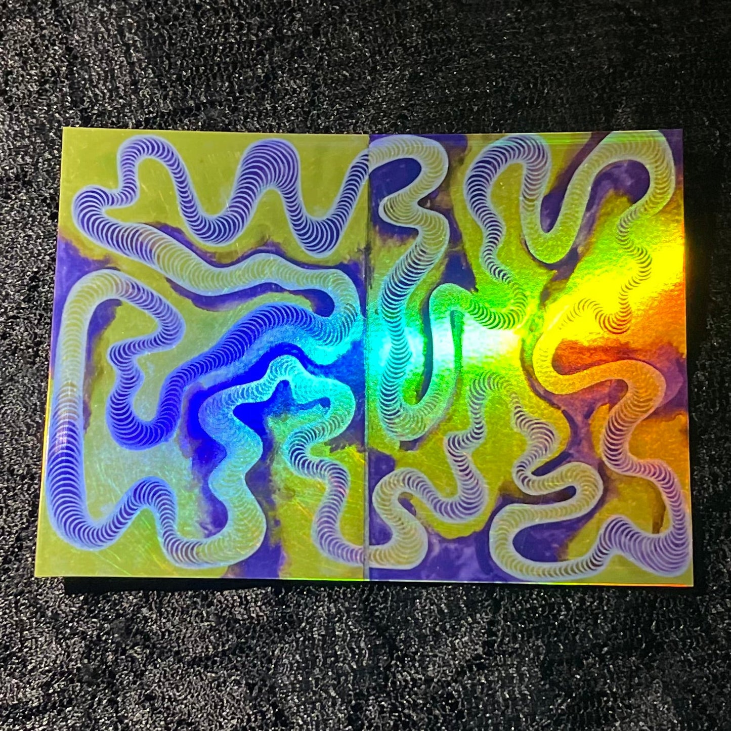 Colorful abstract design on a on a glossy sticker surface