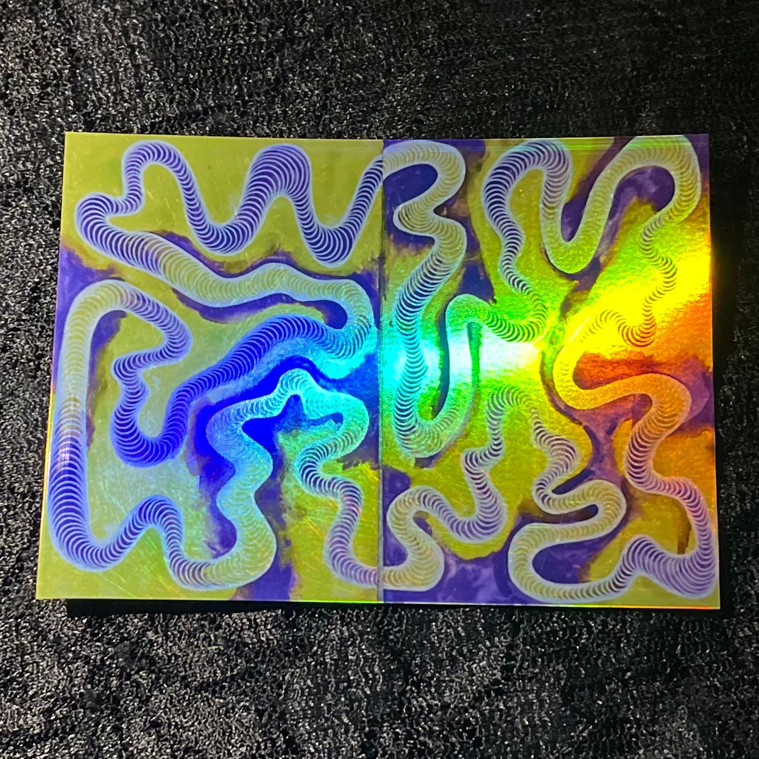 Colorful abstract design on a on a glossy sticker surface